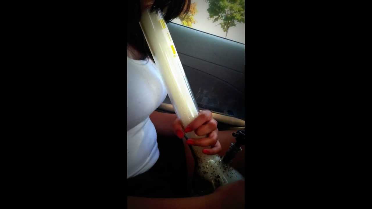Girl does nice bong rip.