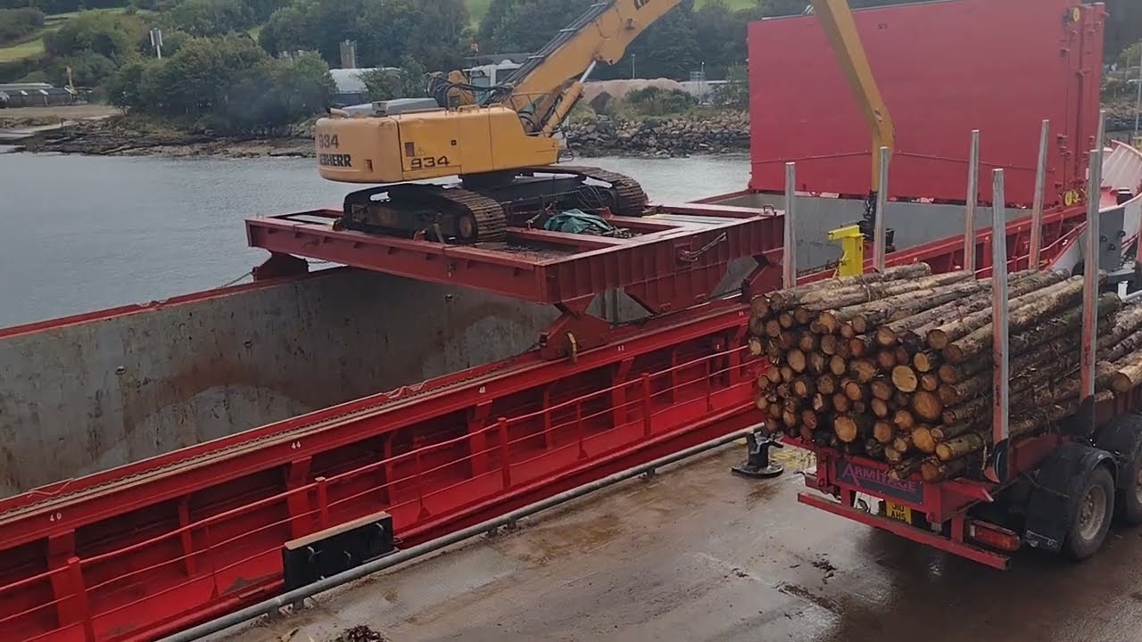 Timber barge CEG Cosmos in action Brodick pier Isle of Arran@davetheraverovingtherock