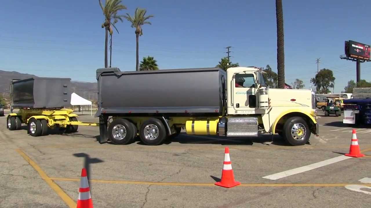 Bruce Campbell In A Peterbilt 388 With Rogue Transfer-Dump Setup Arriving At Truckin' For Kids 2013.