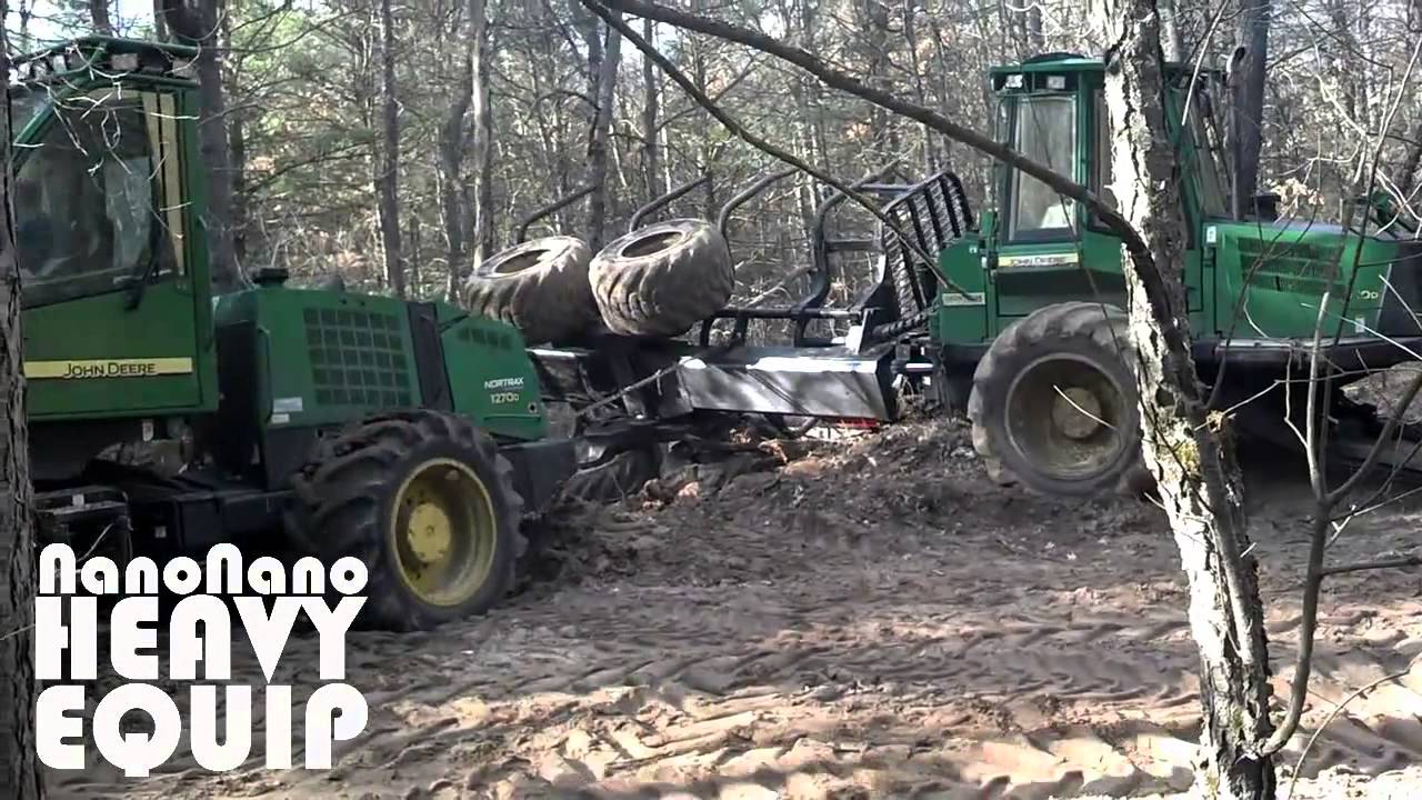 Heavy Recovery John Deere 1270E WHEELED HARVESTER Pulling out flipped 1110e Forwarders