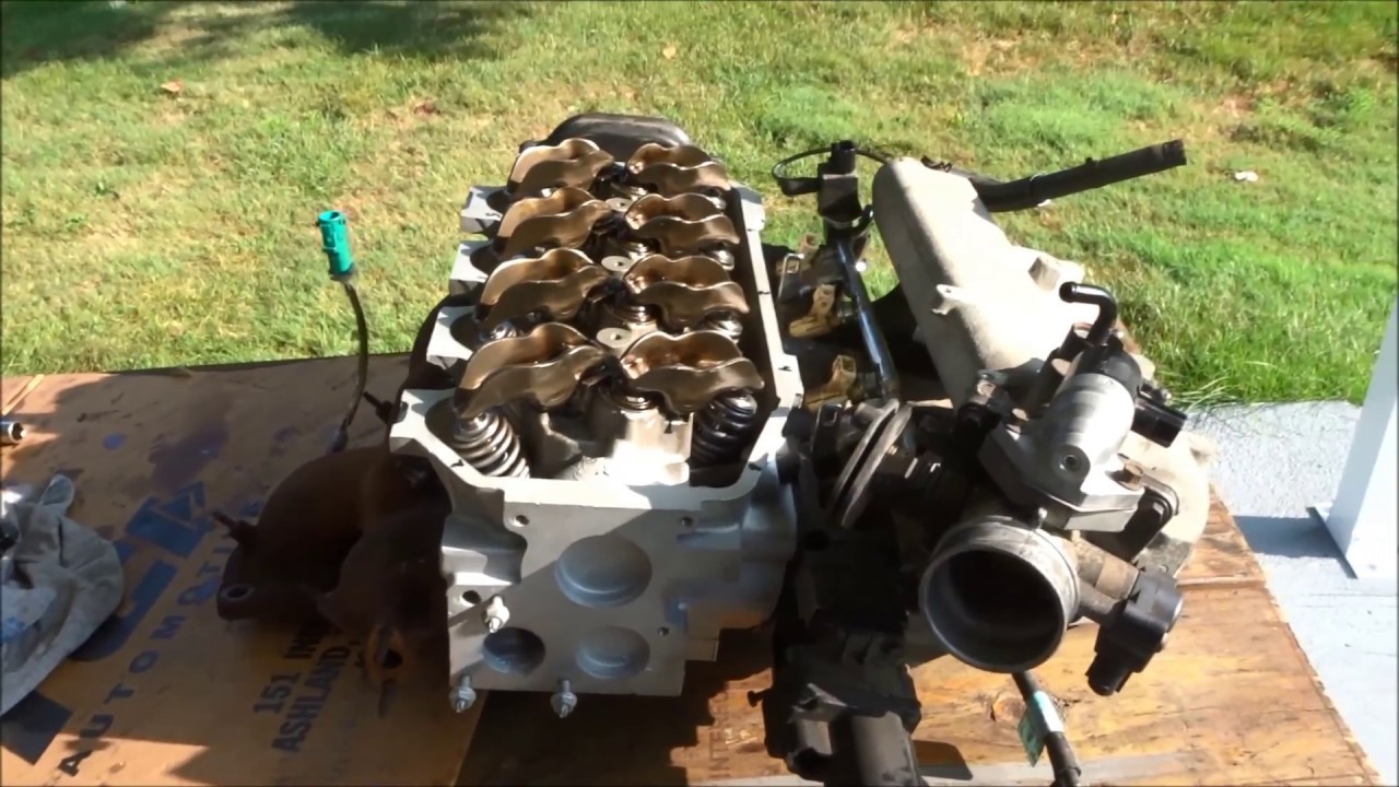 1998 Ford Escort intake valve seat damage repair. Rebuilt head installed