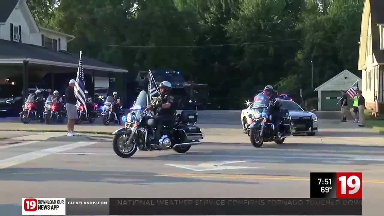 Police escort fallen Lorain Officer Phillip Wagner from funeral home