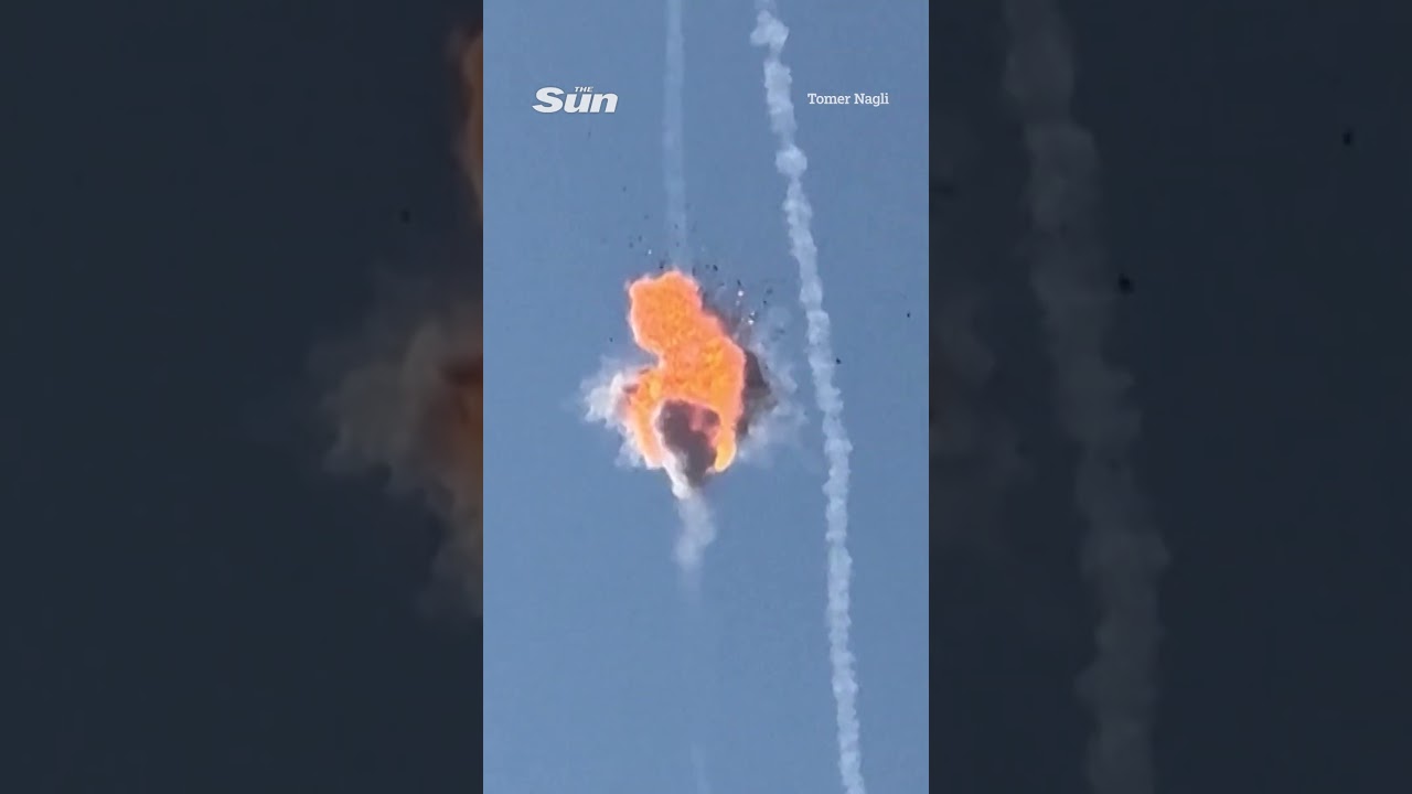 Dramatic moment Iranian drone is blown up over Israel leaving onlookers stunned