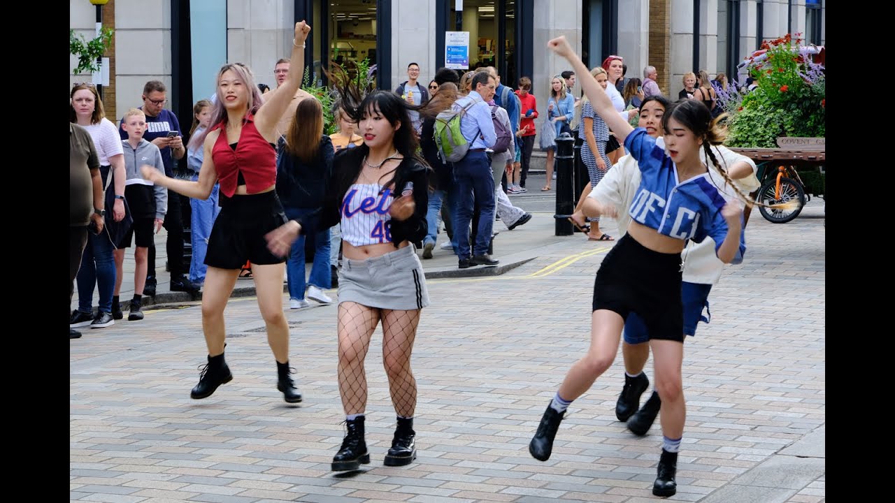 Asian girls dancing in Covent Garden, London - 29th July 2023.