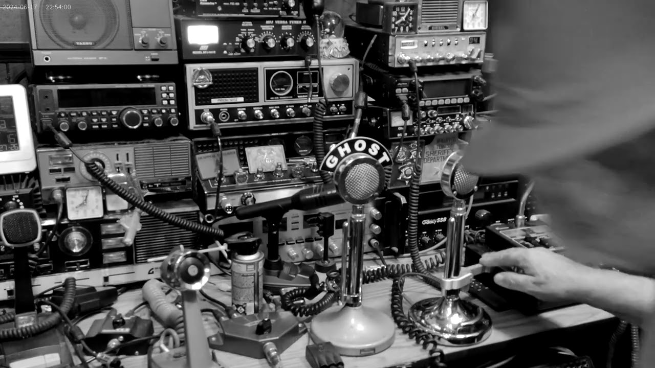Checking out my rebuilt Astatic D-104 across the Pond with cousin Glenn.