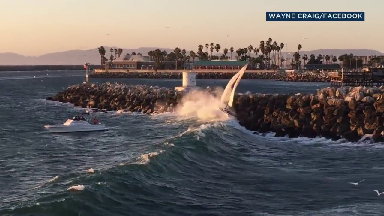 Dramatic video shows rescue of 2 men, dog after sailboat crashes in Redondo Beach | ABC7