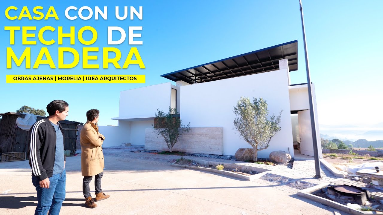 CASA CON UN TECHO DE MADERA | OBRAS AJENAS | IDEA ARQUITECTOS