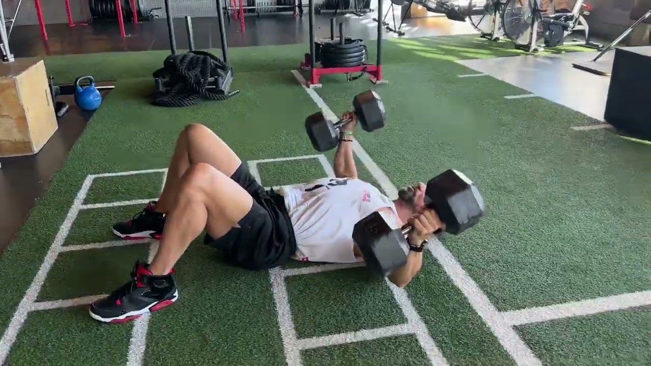 How To Perform The 2 Dumbbell Floor Flies Exercise