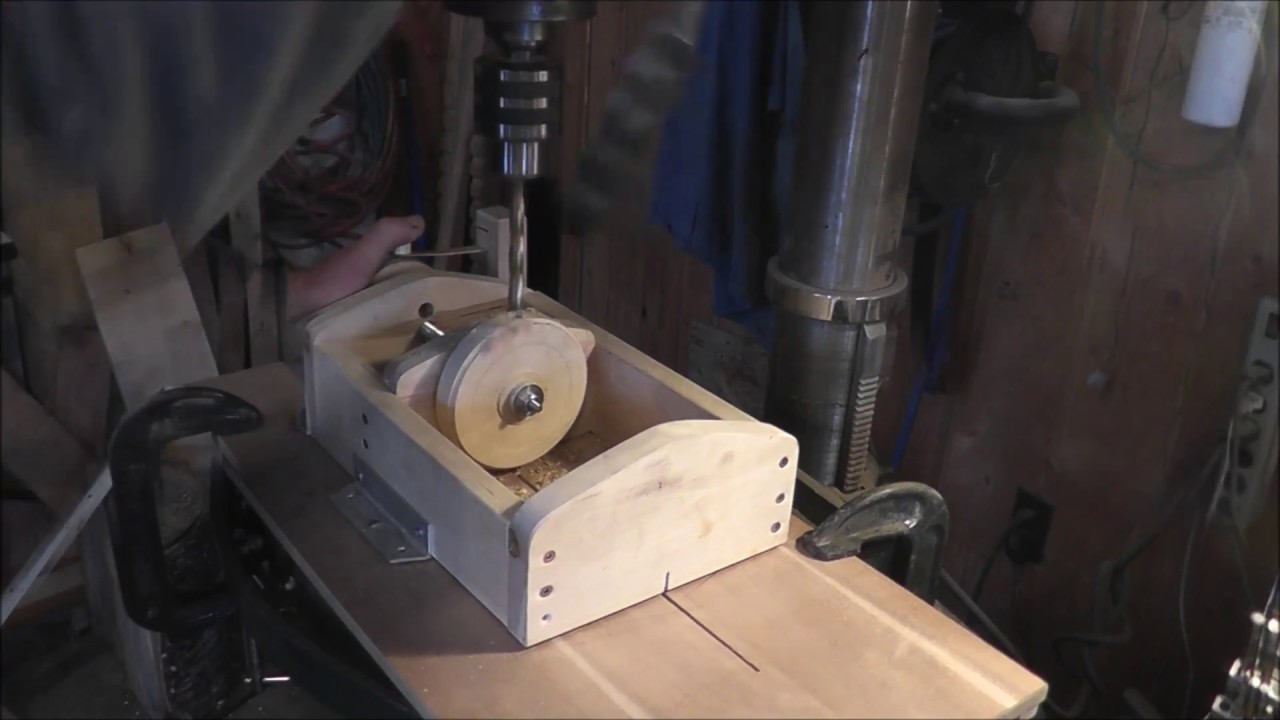 Jig to drill holes in the outer edge of a disc accurately