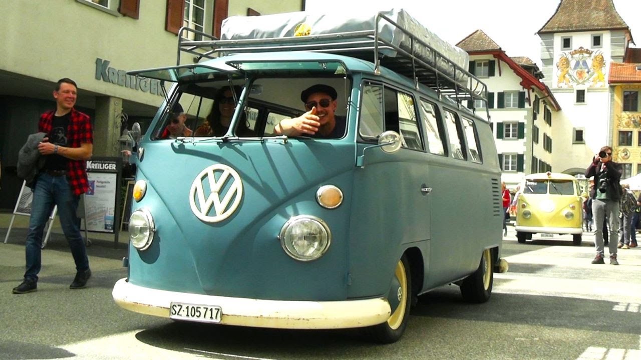 Large VW Bus & VW Beetle Caravan in Historic Swiss Town