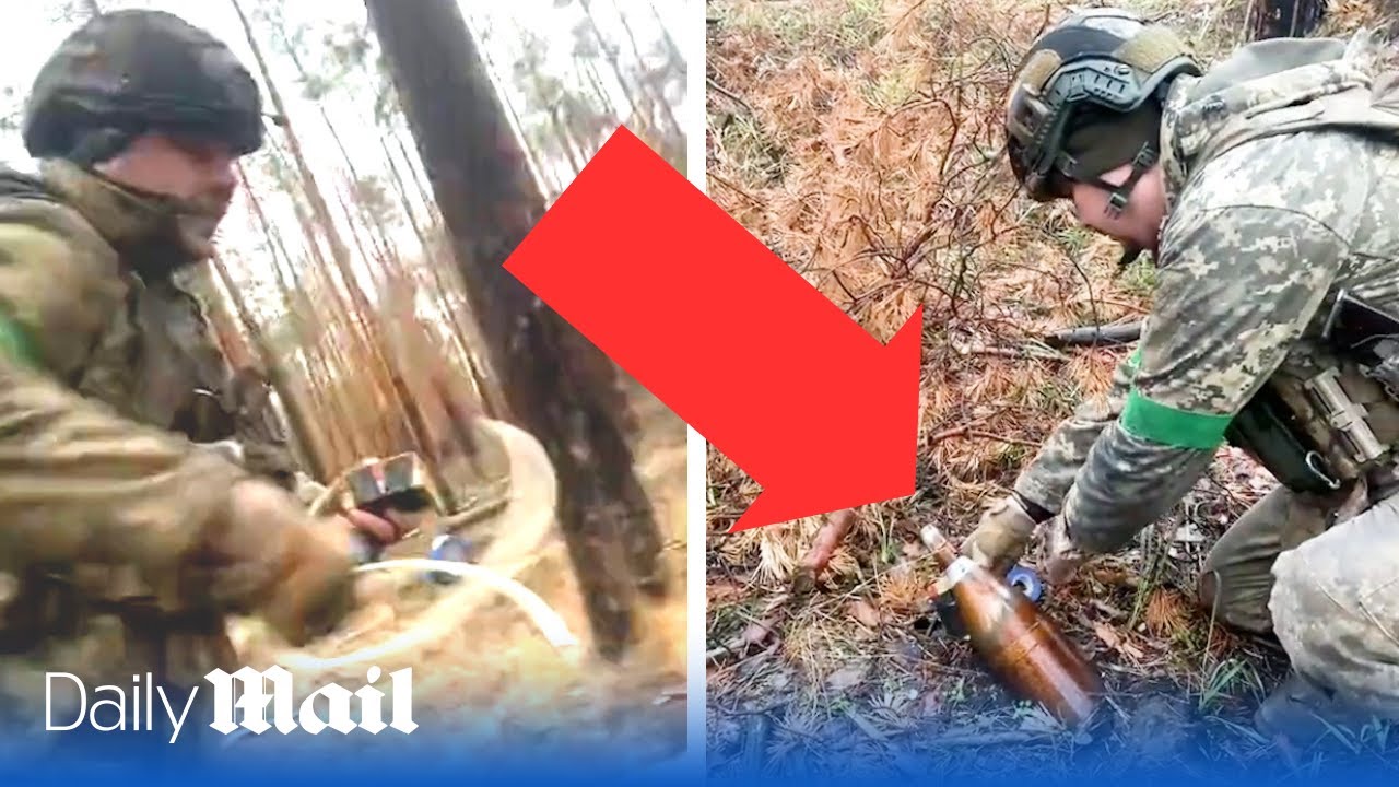Russian shell nearly blows up Ukrainian troops as they try to defuse unexploded bomb