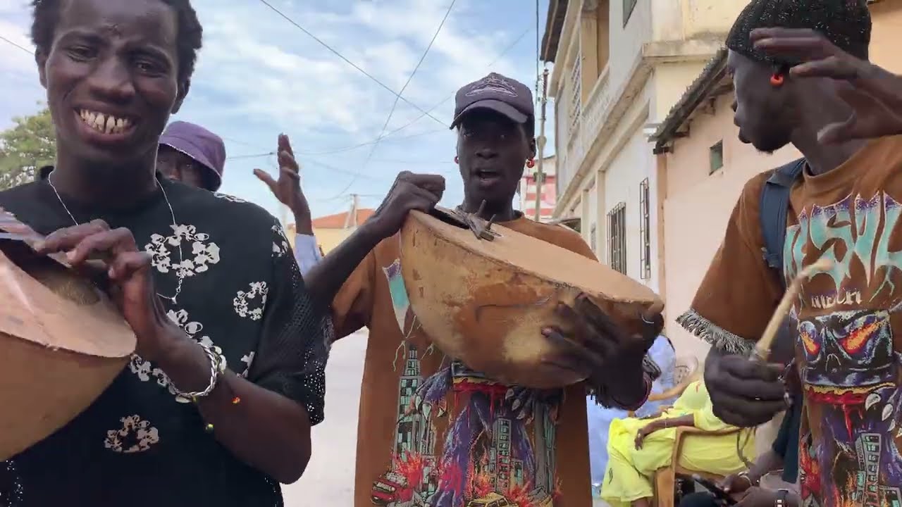 The Wolof Griots with the talking Drum (Tama)