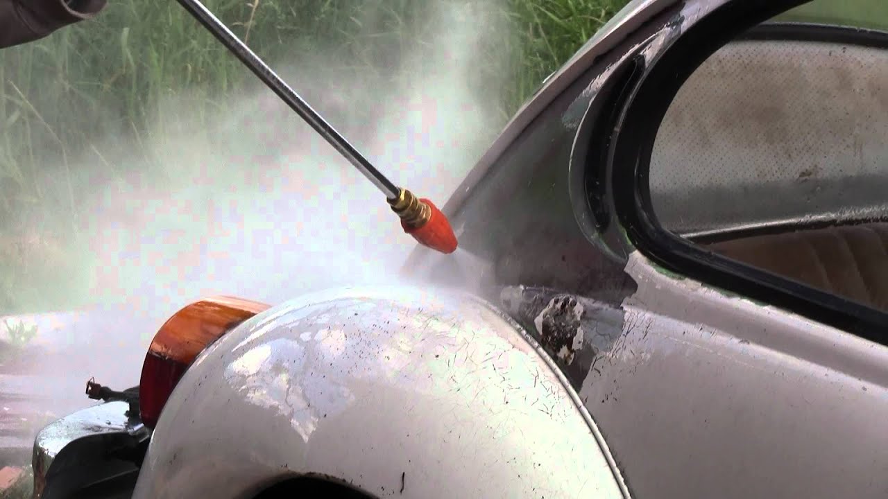 Removing cruddy paint job from 1975 VW Super Beetle using Pressure Washer