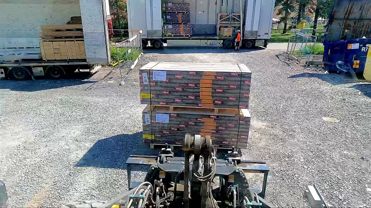 Volvo L60H Wheel Loader Unloading pallets