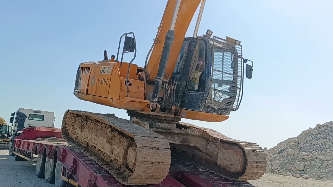 #UNDLOADING EXCAVATOR 165