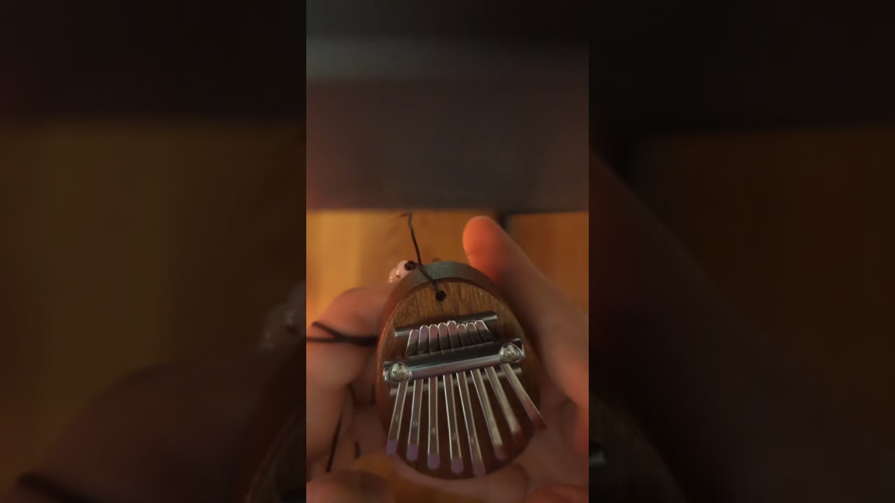 The Office theme song on mini Kalimba