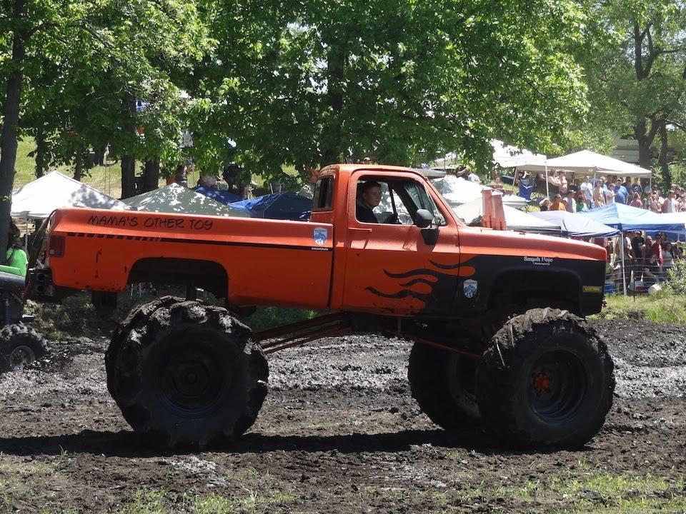HUGE TRUCKS Mud Bogging at Perkins Mud Bog 2014  / The Movie!