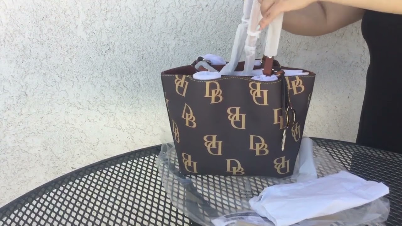 It is still on sale! Unboxing Dooney and Bourke Monogram small Flynn
