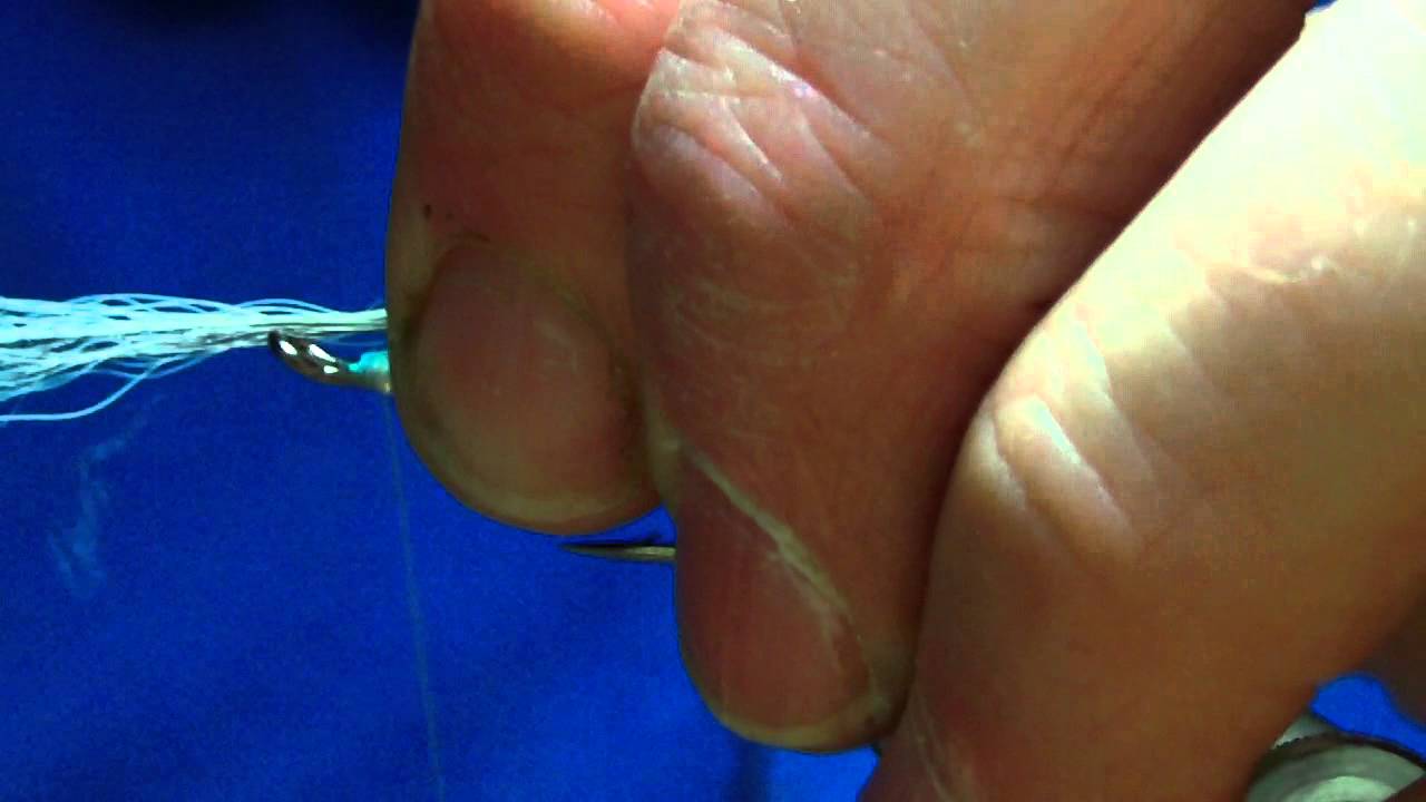 tying a longtail silver doctor.