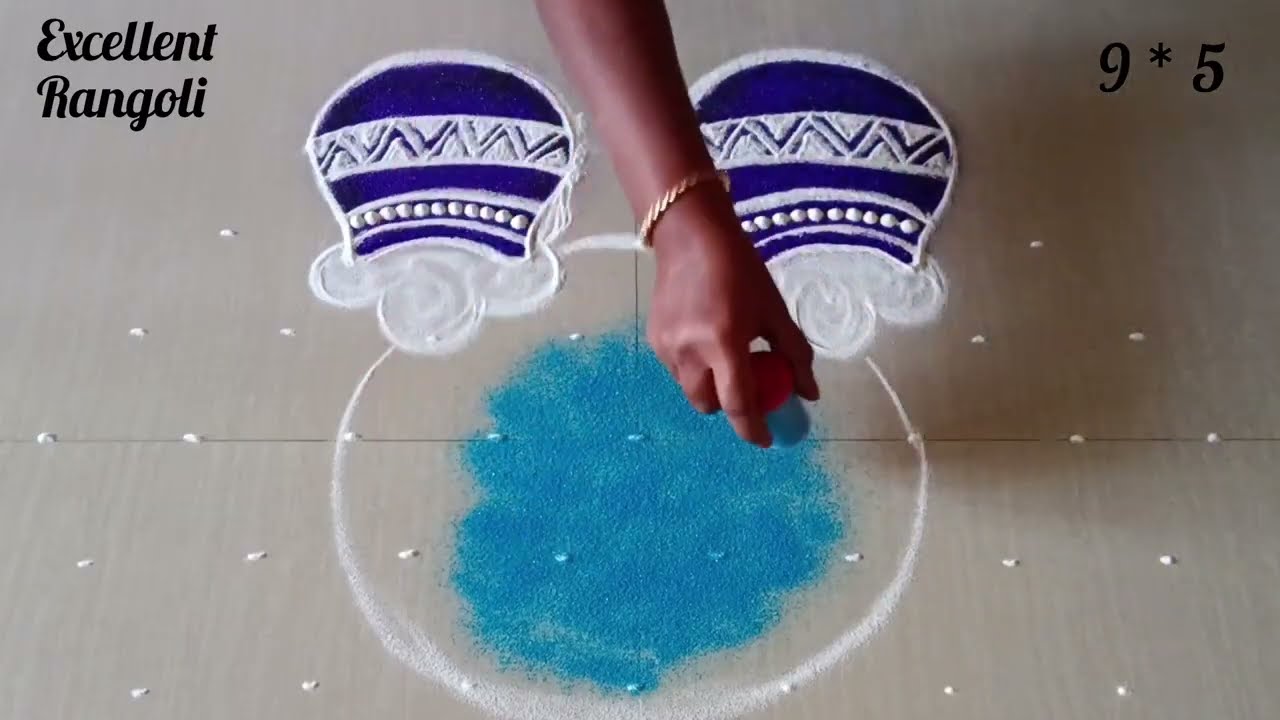 9*5 dots 12Peacocks & 2pongal pots kolam 