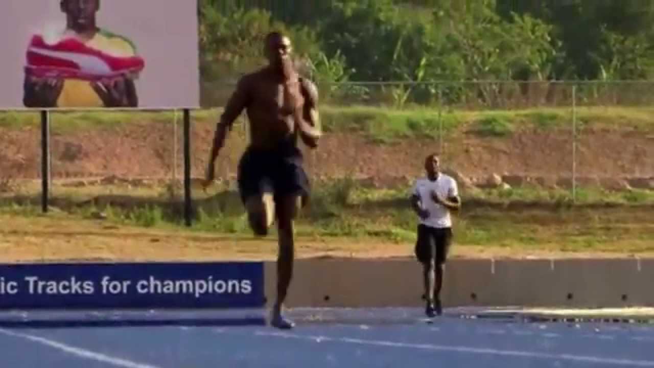 Usain Bolt trains with his coach Glen Mills in Jamaica