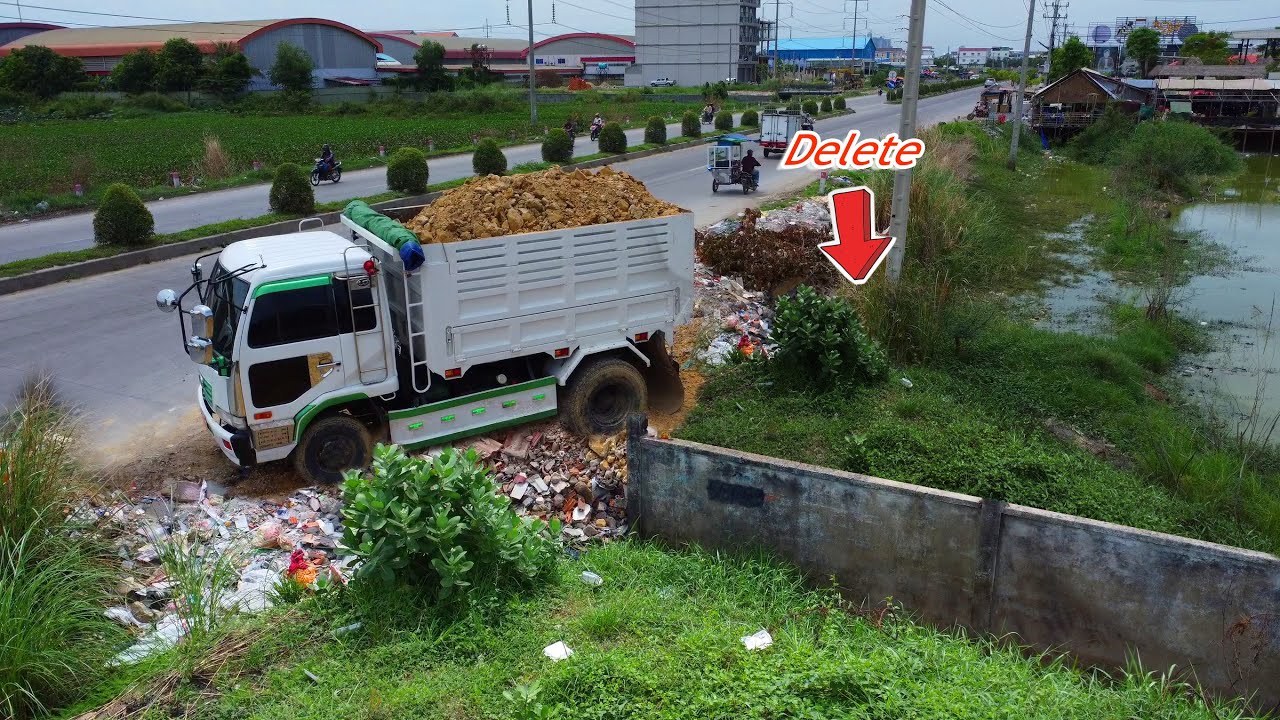 Starting Project Landfill using 5Ton Dump truck, Komatsu D31P bulldozer Pushing soil, Mix VDO