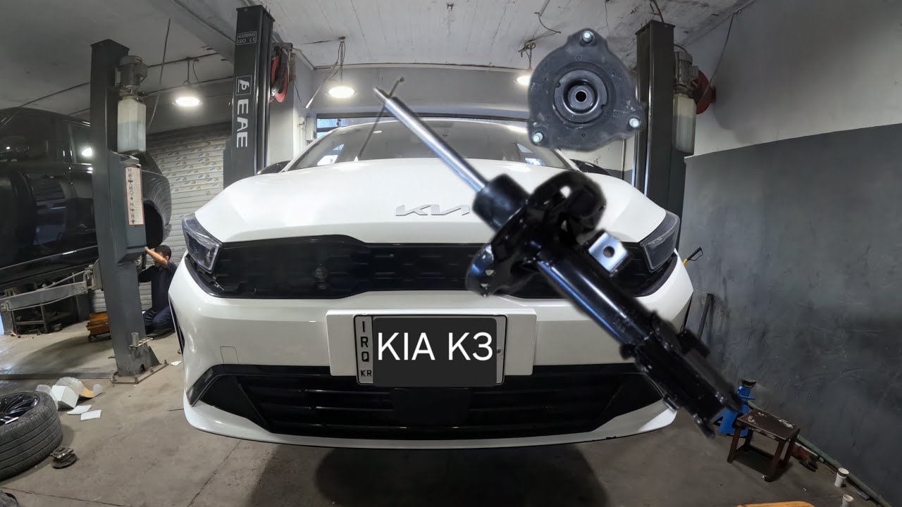 Sustitución del amortiguador delantero - soporte del amortiguador . Kia K3 (especificaciones de par)
