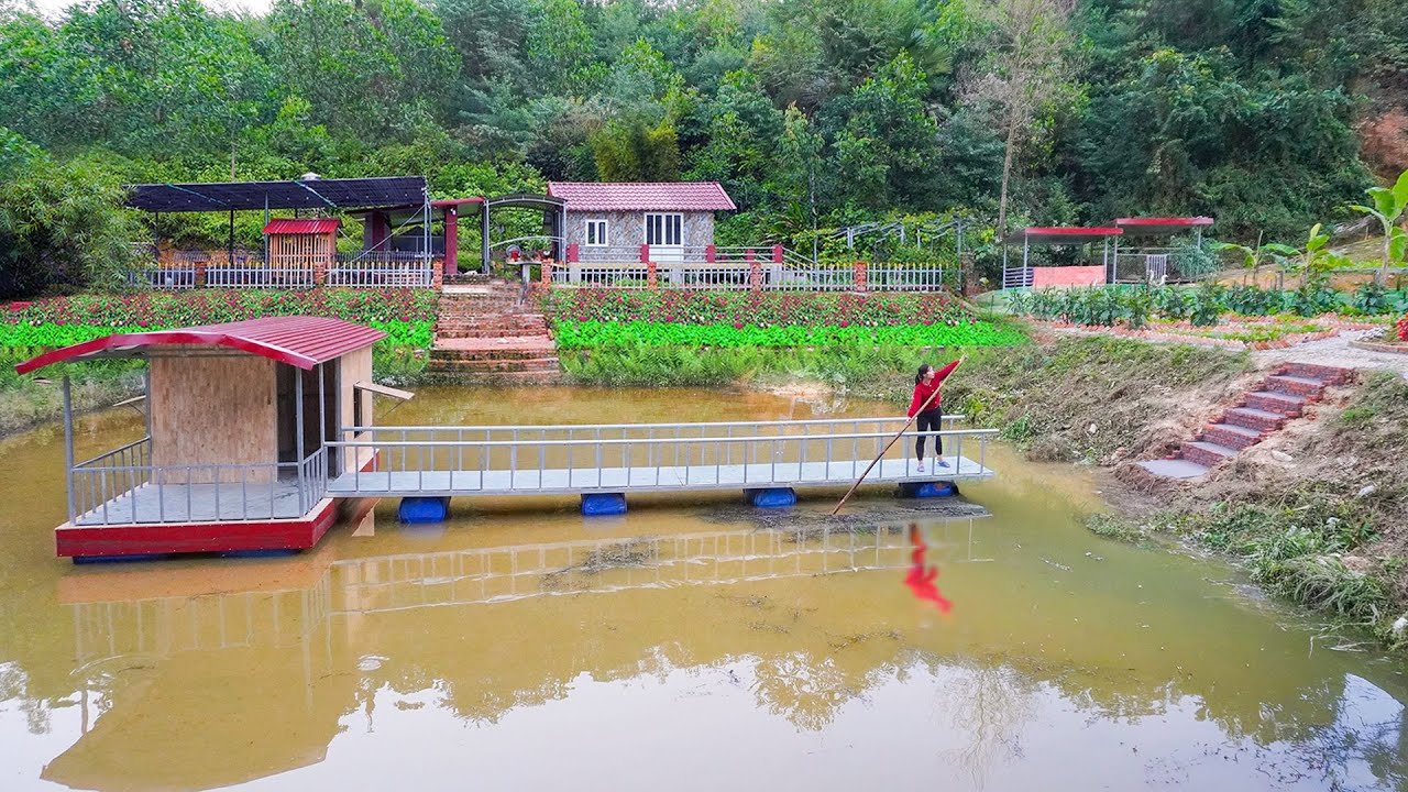 Building Steps with Bricks Connected to Floating Bridge And Fixed House in the Middle of the Lake