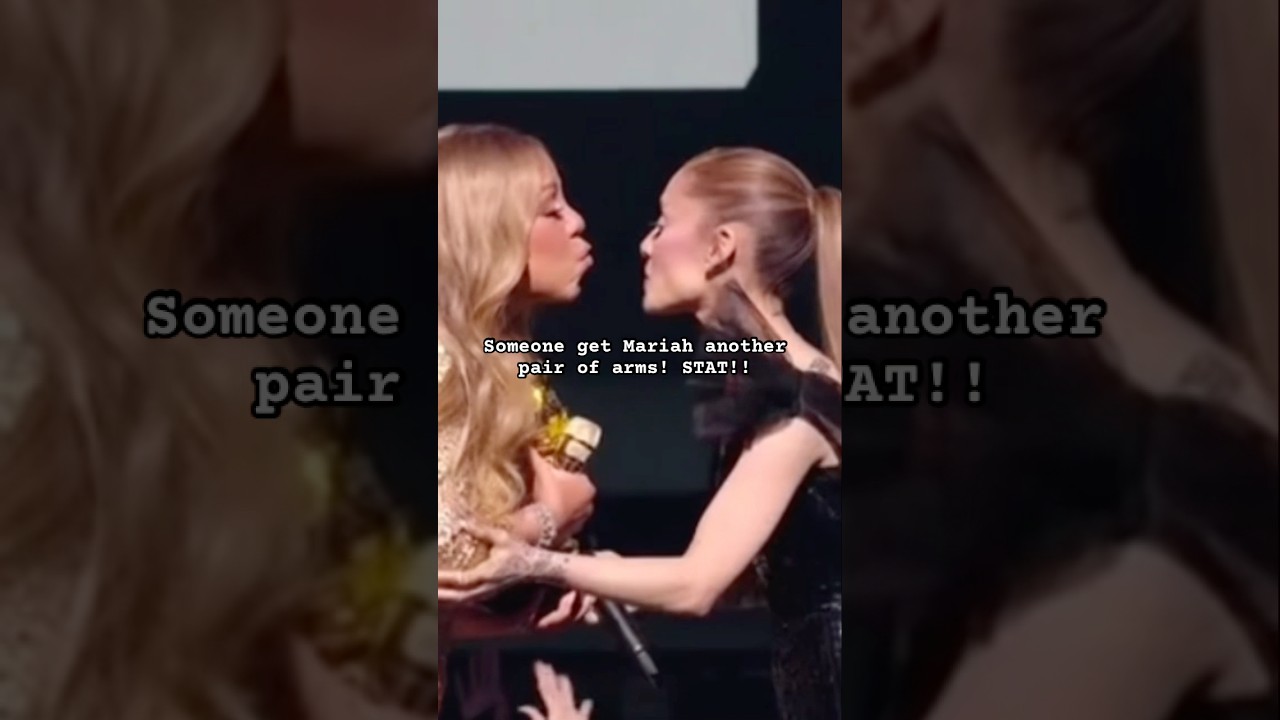 Mariah Carey and Ariana Grande share a sweet moment at the VMAs #mariahcarey #arianagrande