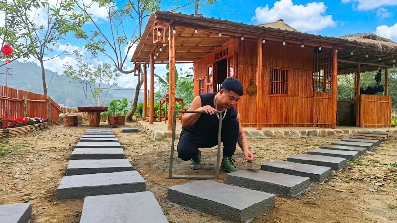 CEO Trieu Nguyen transforms a dirt yard into paradise: Creating a stunning concrete walkway.