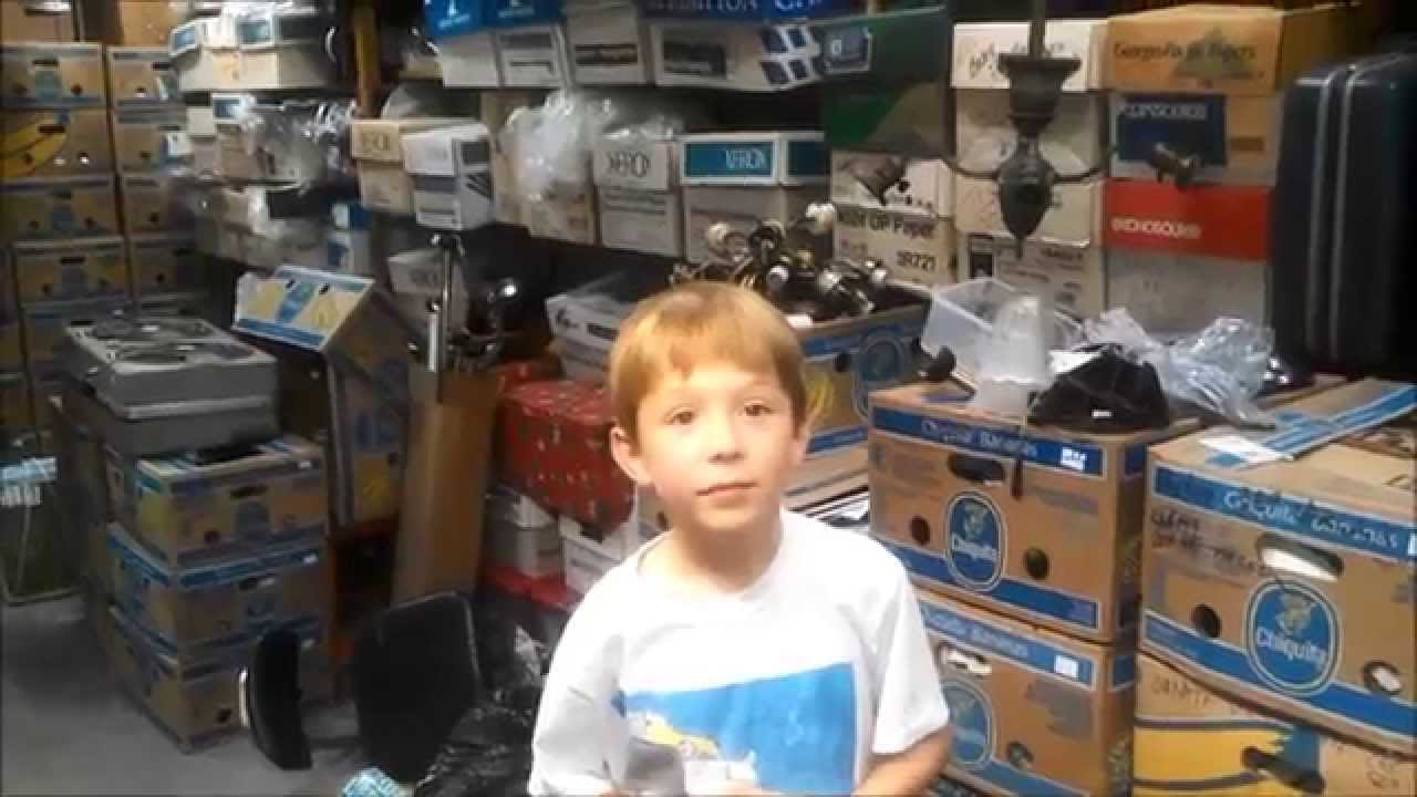 Reece, 9 year old fan collector, visits my fan shop.