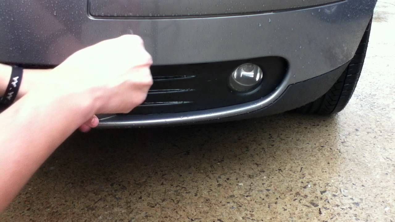 Volvo S40, снятие крышки противотуманных фар