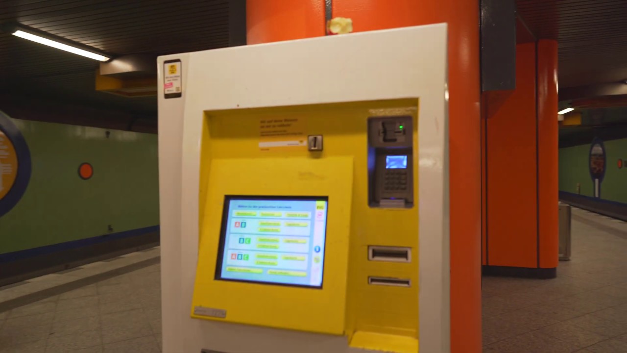 Germany, Berlin, Siemensdamm U-Bahn Station, buying 7 days ticket, 2X escalator