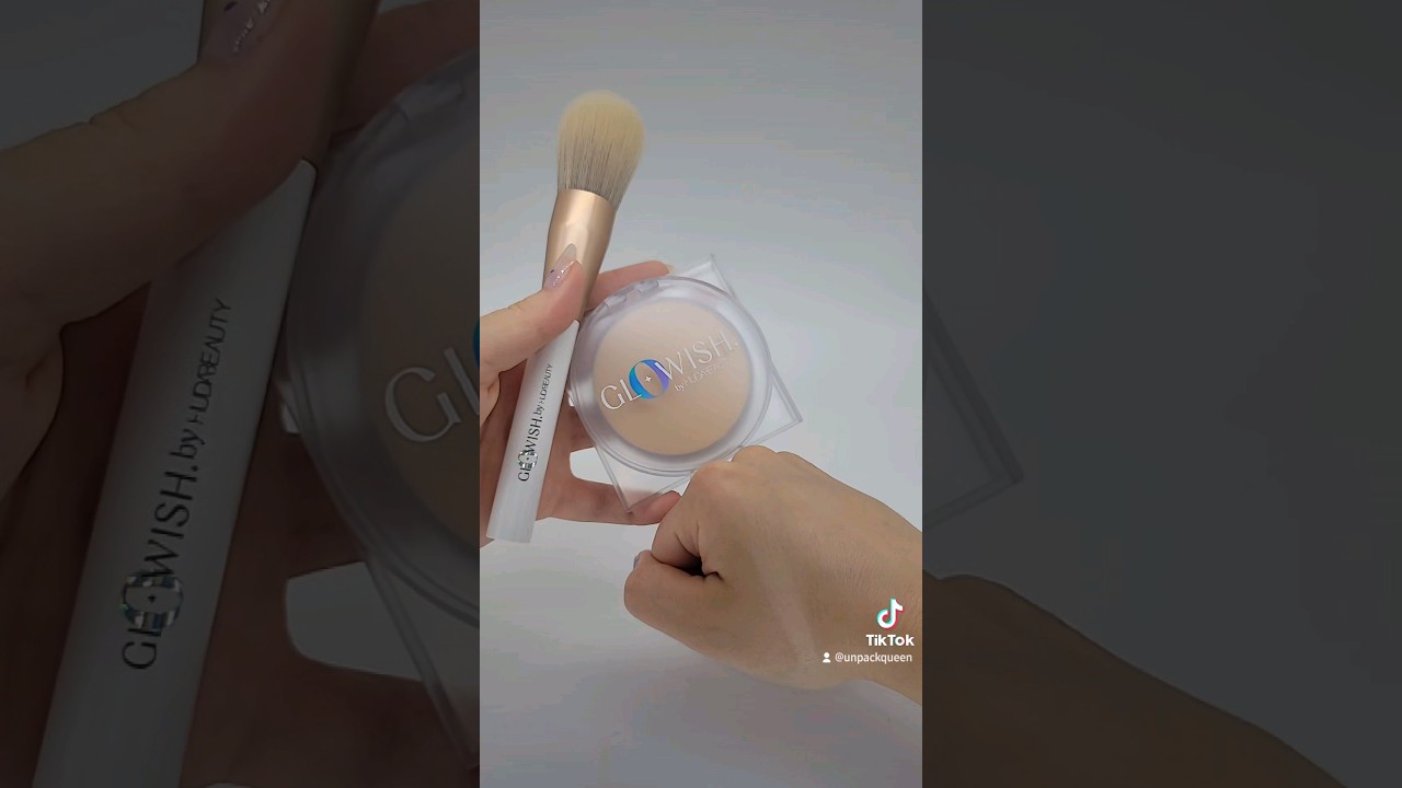 Huda Beauty Glowish Luminous Pressed Powder and the Face All Over Powder Complexion Brush
