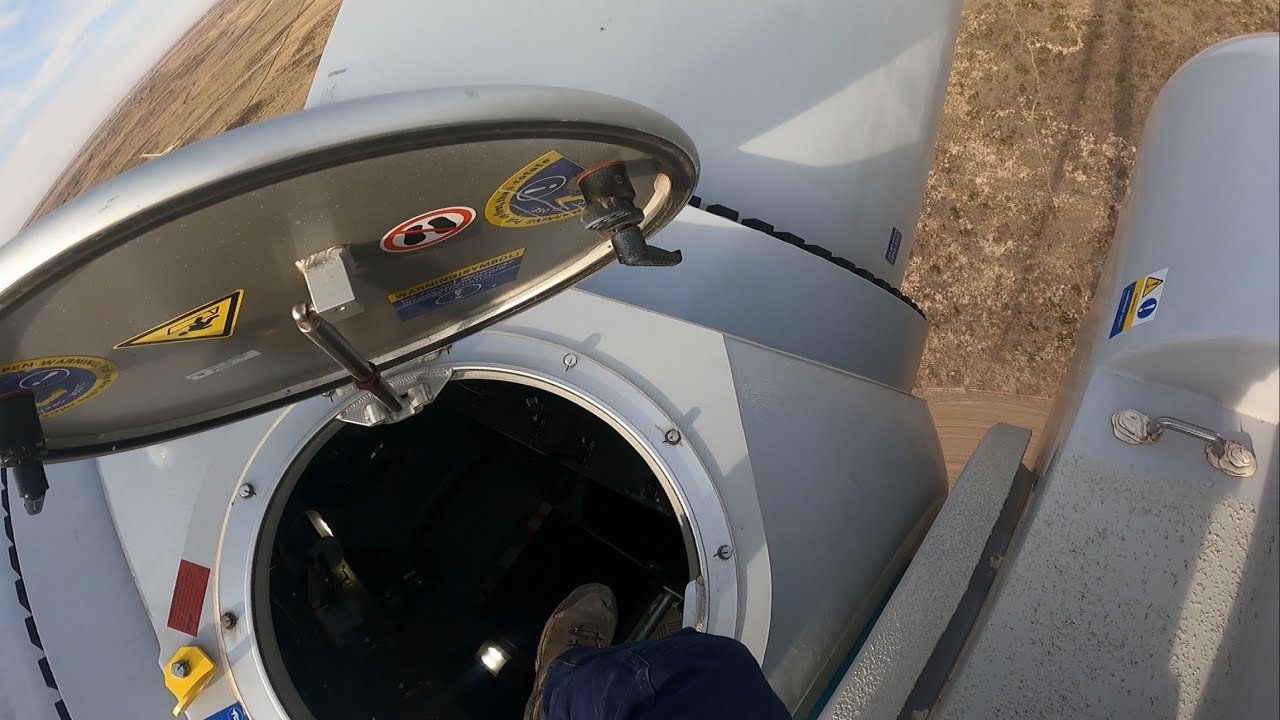 Climbing into nosecone on top of a Wind Turbine