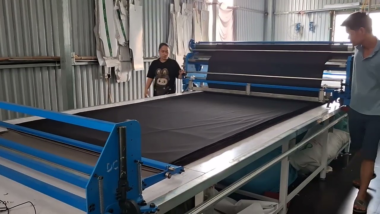 m&aacute;y trải vải lật &uacute;p zigzag . chạy tự động bằng cơm 50m/ph&uacute;t .p2