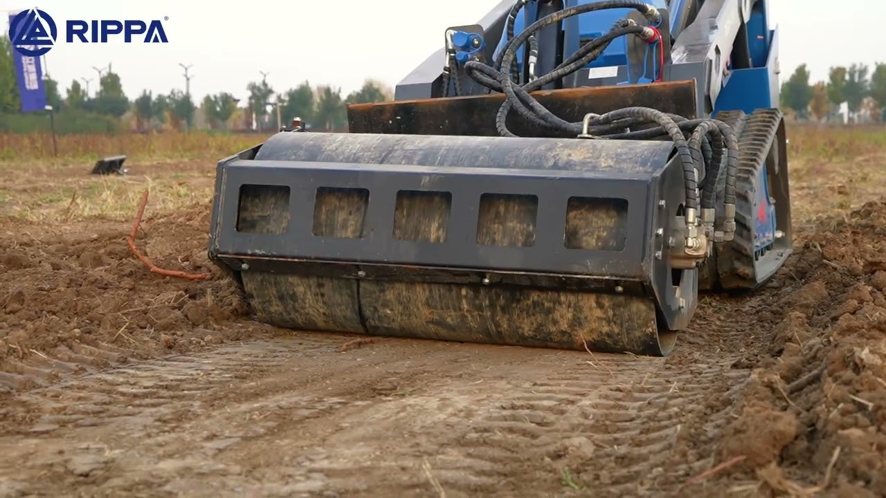 Rippa RS06-2 mini skid steer with the vibratory roller attachment.