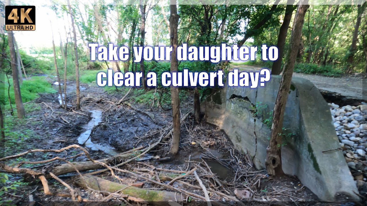 Unclogging a Culvert with my daughter on a Sunday afternoon