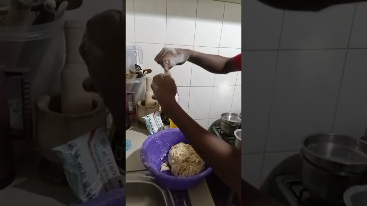 Preparing fried bread (Mandazi) for breakfast 