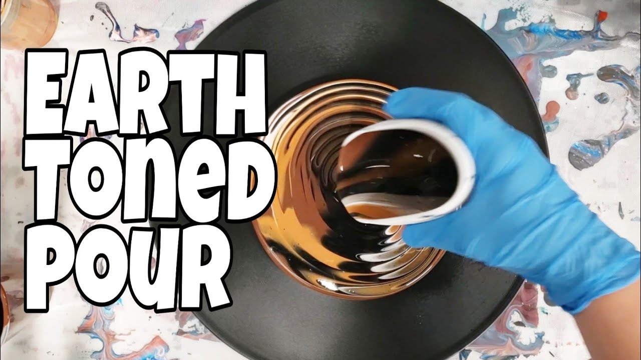 Earth toned acrylic pour on a vinyl record