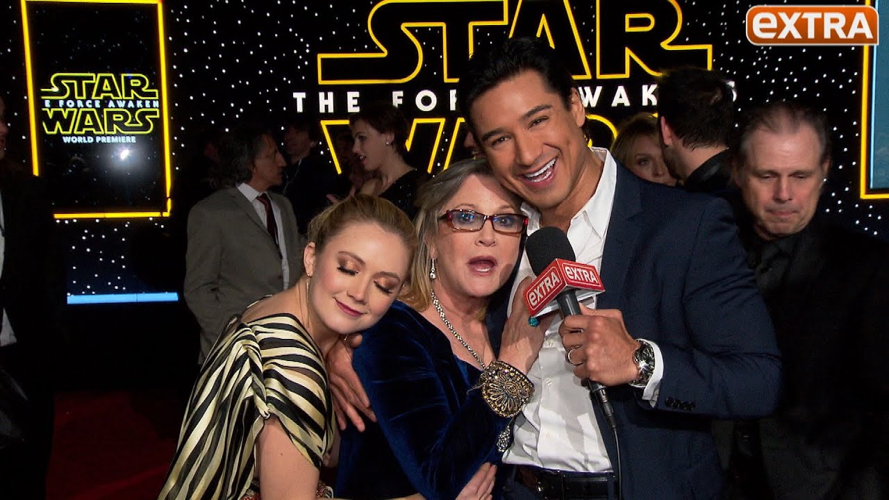 'Star Wars' Premiere: Carrie Fisher Cuddles & Serenades Mario Lopez on the Carpet