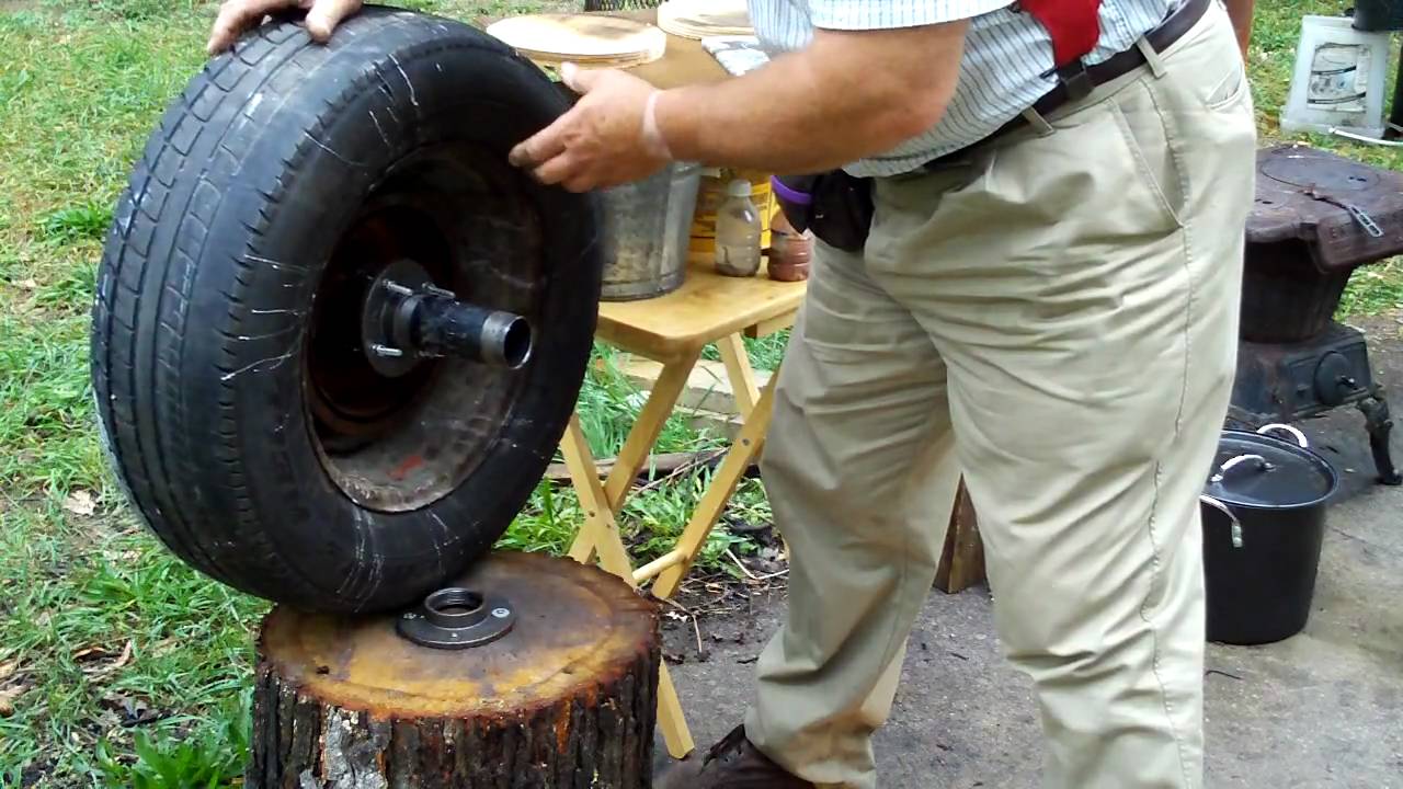 throw pottery on a car wheel and tire~by Hillar Bergman