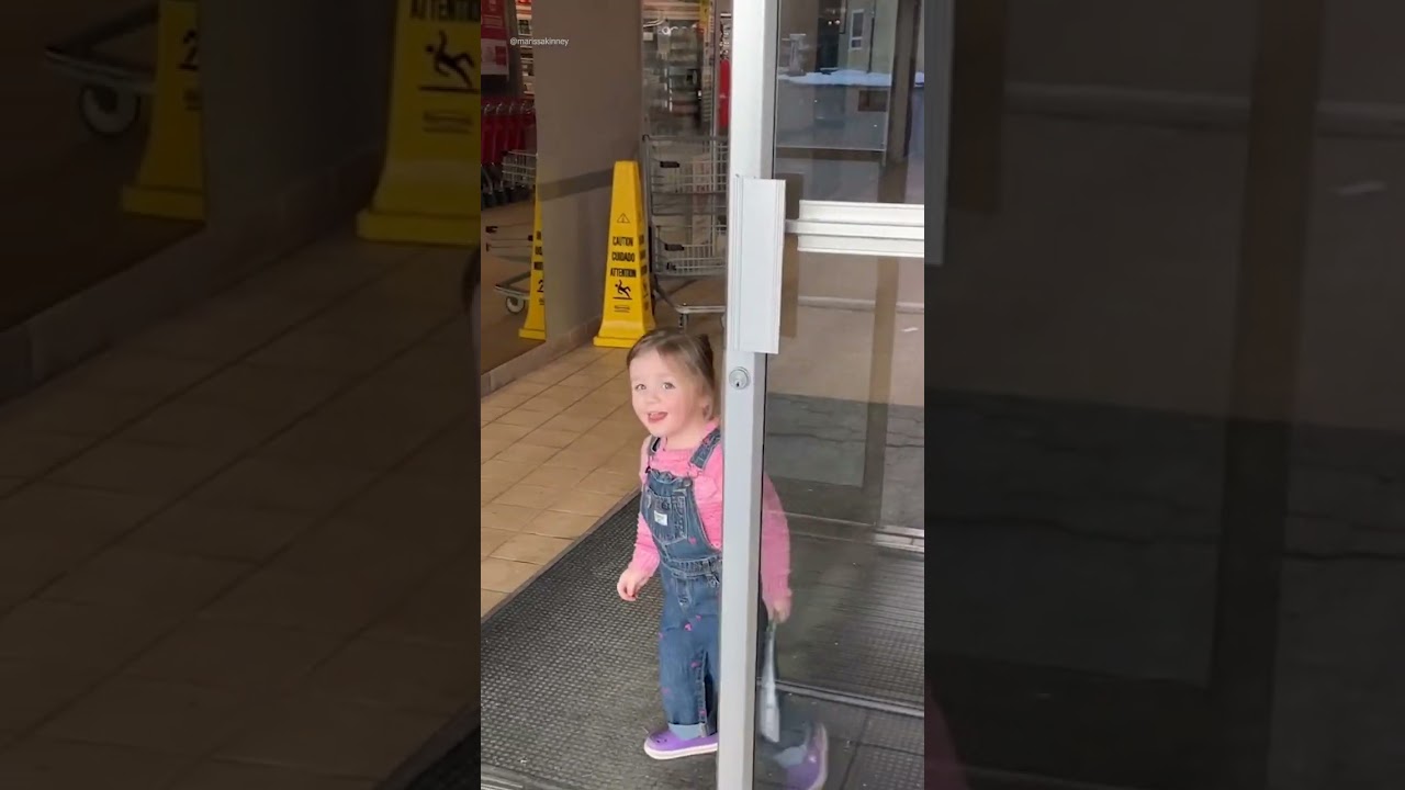 LITTLE GIRL GETS STUCK BEHIND OPEN DOOR