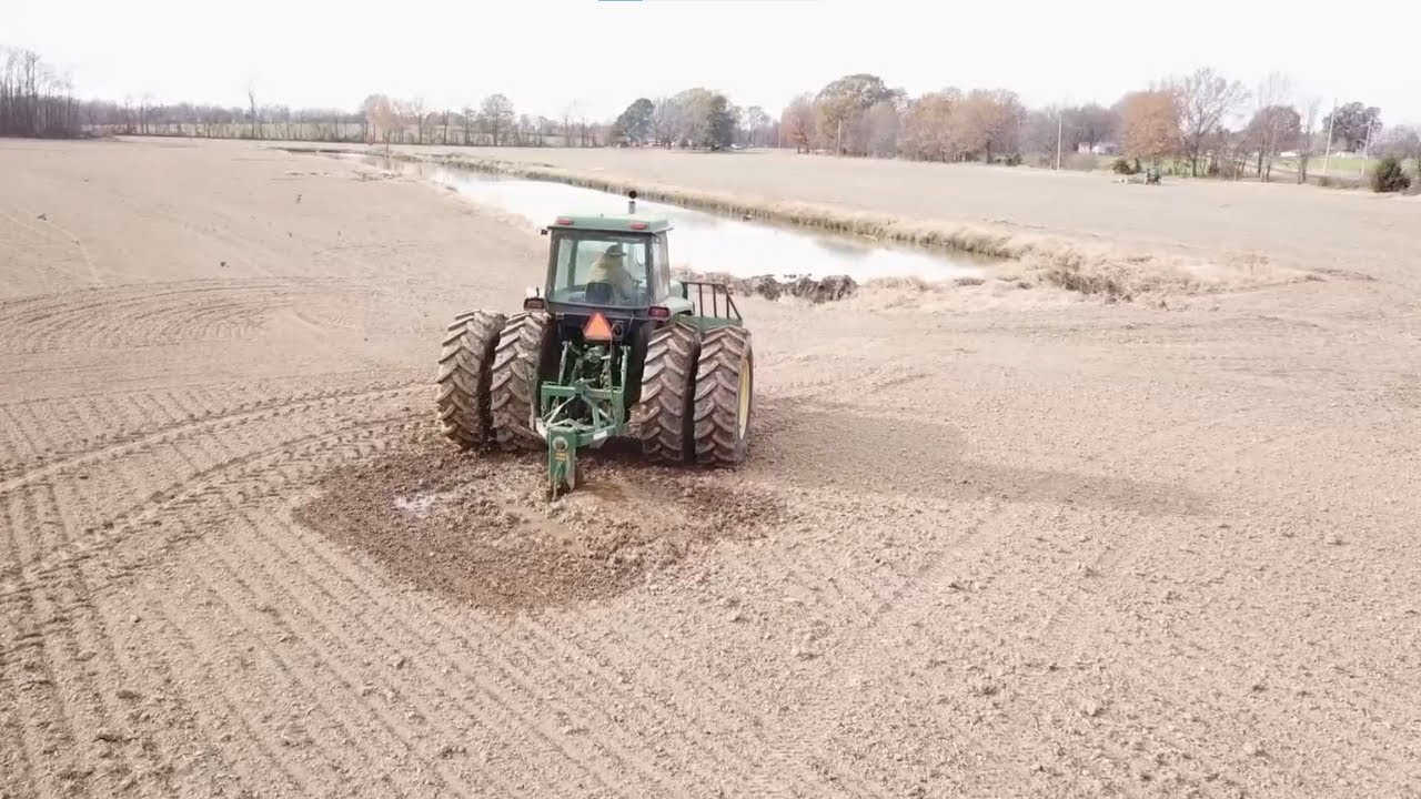 Draining the Swamp......Running PTO Ditches on springy ground.