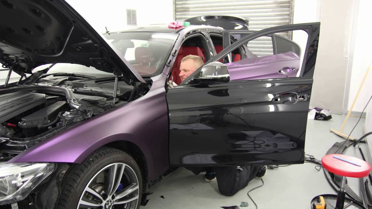 Epic looking BMW 3 series fully wrapped in Purple/Black matt vinyl