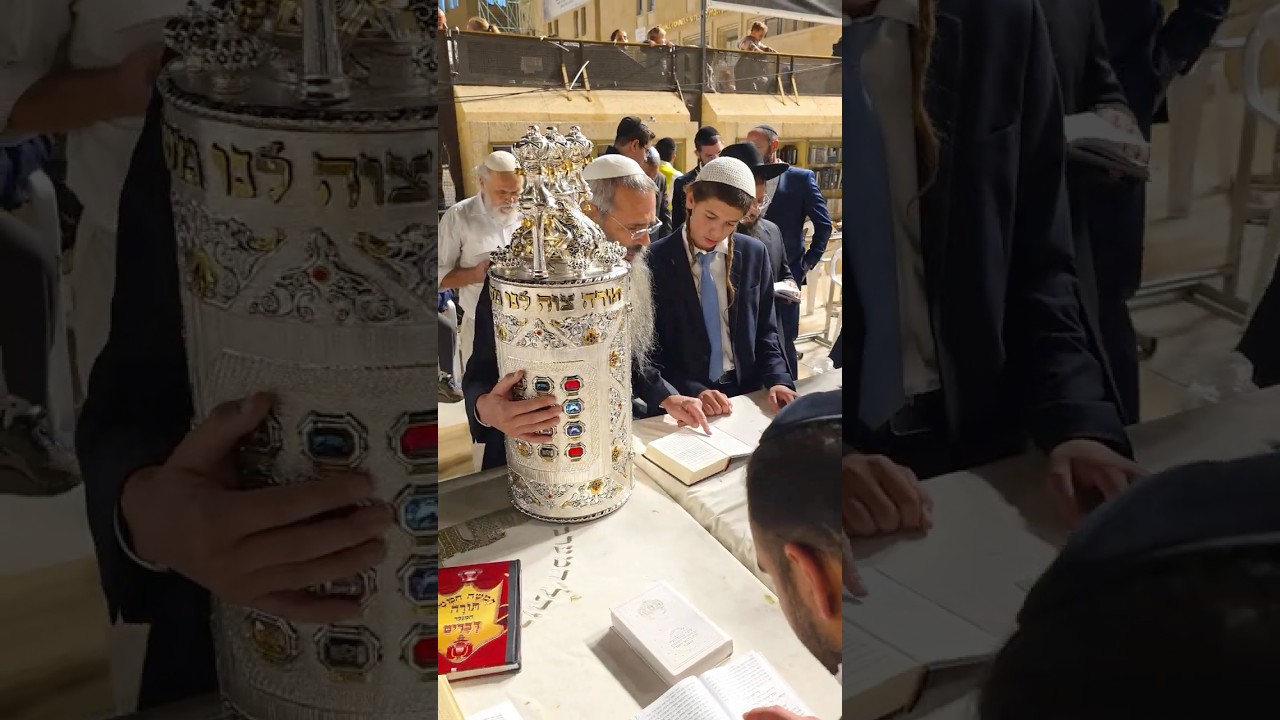 Jews celebrate the Simchat Torah holiday at the Western Wall in Jerusalem, Israel, in 2025