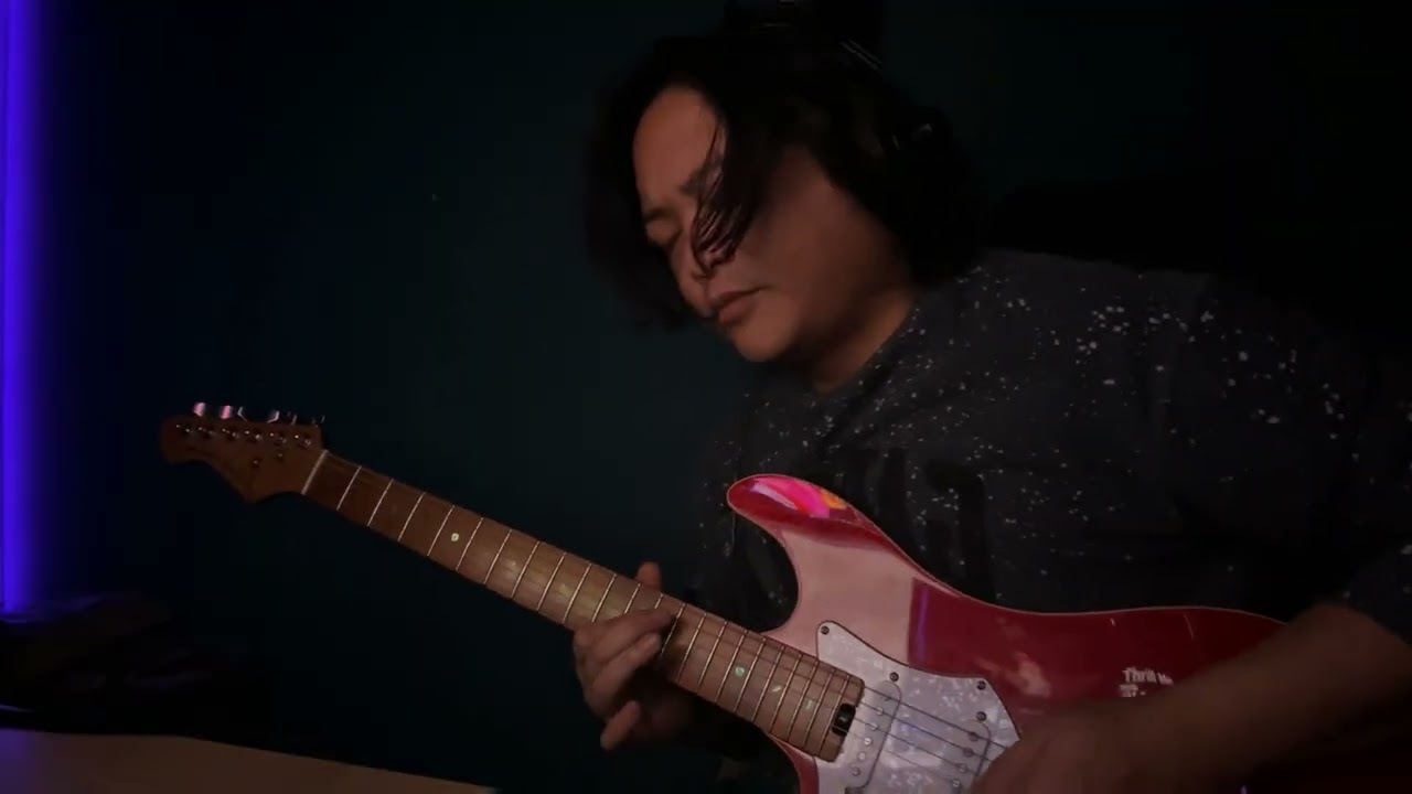 Freestyle guitar solo on random epic rock ballad backing track