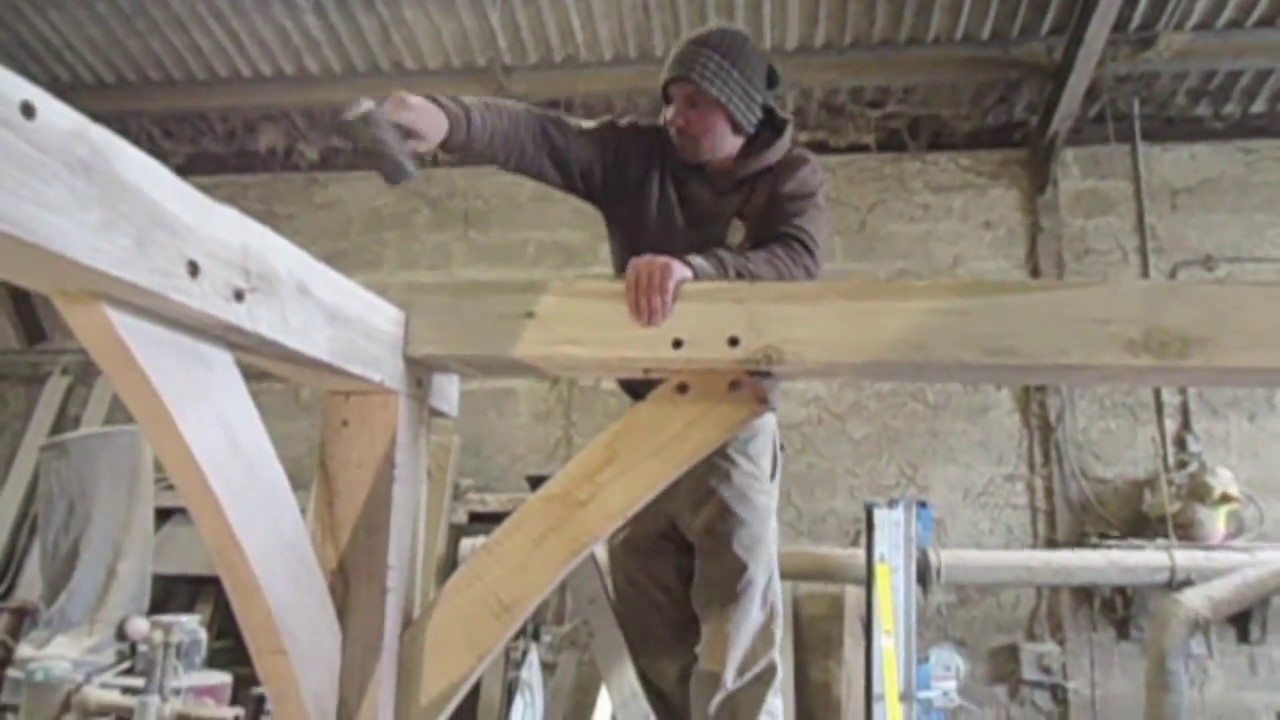 Our simple green oak shed frame being assembled.