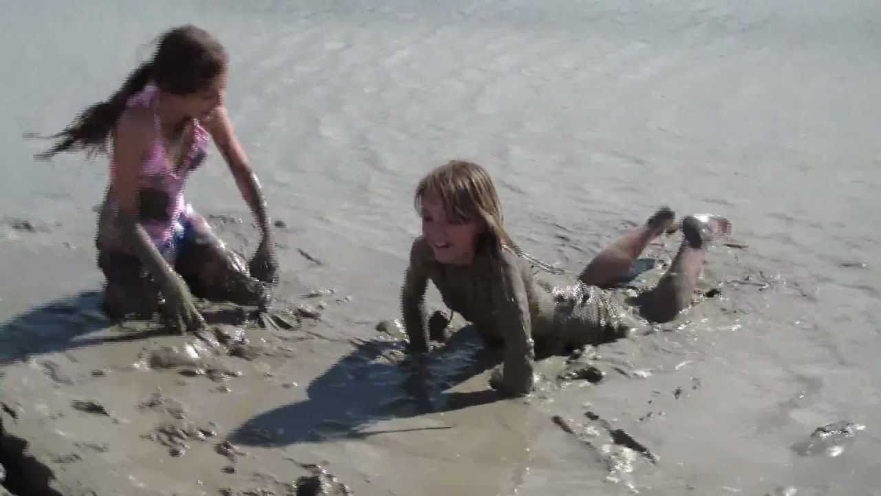 Girls playing in mud