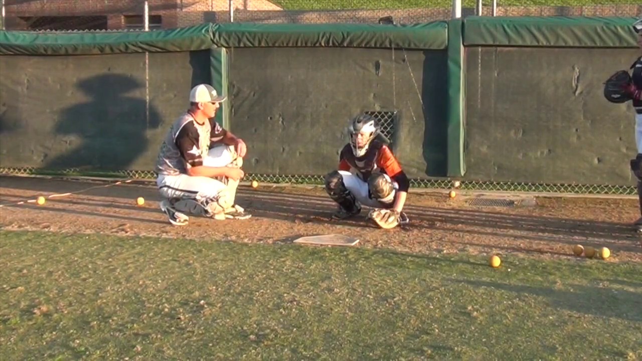 How to be a better catcher...blocking and receiving with 2-strikes. Next Level Catching Academy